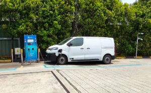 Electric van charging at an SP Group EV station, showing Mecpec’s practical step toward future-ready operations.